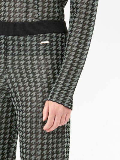 Jw Anderson Check-pattern Logo-plaque Trousers In Schwarz