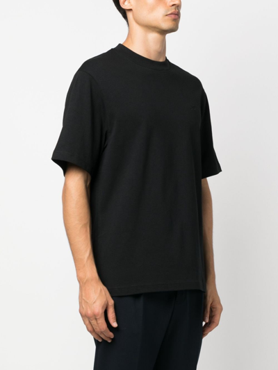 Shop Axel Arigato Embroidered-motif Short-sleeve T-shirt In Schwarz