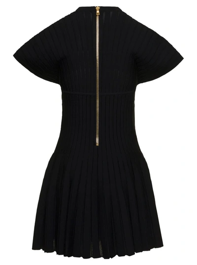 Shop Balmain Short Sleeves Pleated Knit Short Dress In Black