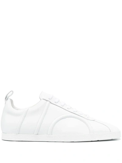 Shop Totême Sneakers In White