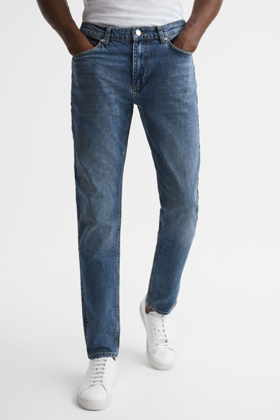 Shop Reiss Athens - Mid Blue Mid Rise Tapered Jeans, 30