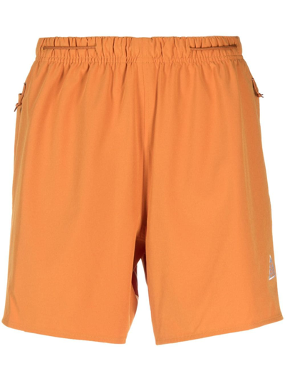 Shop Nike Acg Dri-fit Shorts In Orange