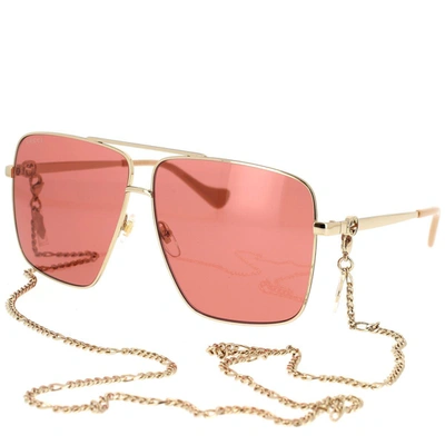 Shop Gucci Eyewear Sunglasses In Gold