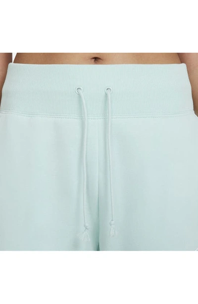 Shop Nike Sportswear Phoenix High Waist Wide Leg Sweatpants In Jade Ice/ Sail