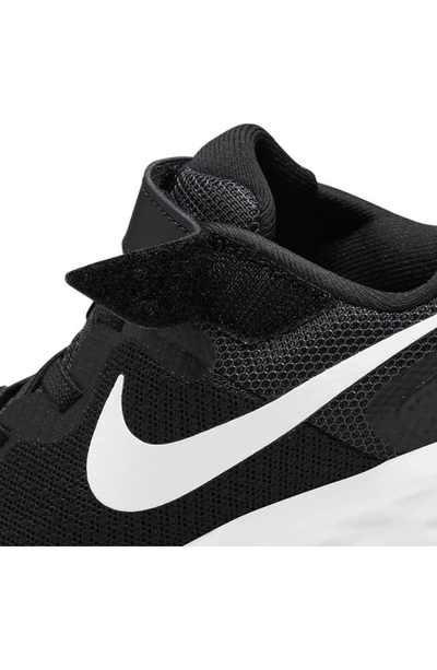 Shop Nike Revolution Sneaker In Black/ White