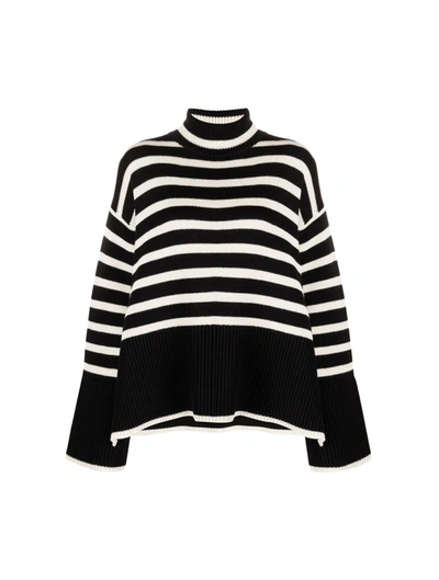 Shop Totême Striped Sweater In Black