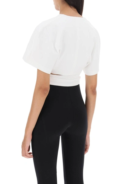 Shop Alaïa Cropped Top With Crossover Straps