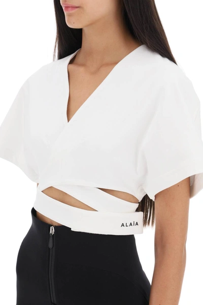 Shop Alaïa Cropped Top With Crossover Straps
