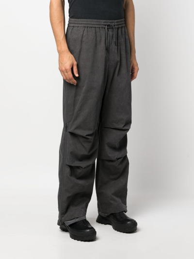 Shop Juunj Waffle-effect Drawstring Track Pants In Grey