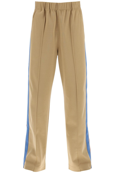 Shop Moncler Jogger Pants With Side Bands In Beige