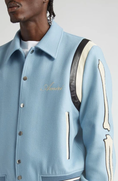 Shop Amiri Bones Wool Blend Varsity Jacket In Slate Blue