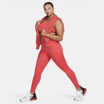 Shop Nike Women's Go Firm-support Mid-rise Full-length Leggings With Pockets In Red