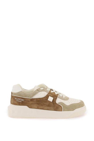 Shop Valentino One Stud Crust And Nappa Leather Sneakers In White,beige