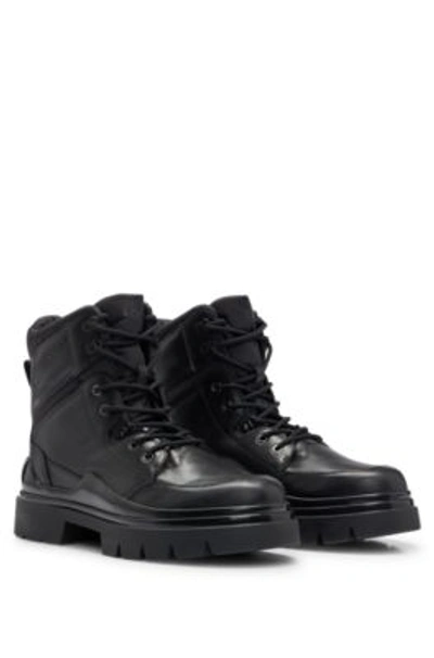 Shop Hugo Boss Chunky Half Boots In Leather With Logo Details In Black