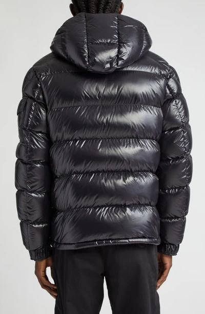 Shop Moncler Maya Lacquered Nylon Down Jacket In Black