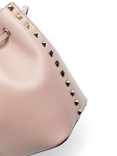 Shop Valentino Rockstud Leather Bucket Bag In Rosa