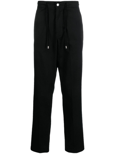 Shop Roberto Cavalli Logo-embroidered Cotton Trousers In Black