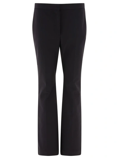 Shop Givenchy Flared Trousers In Black