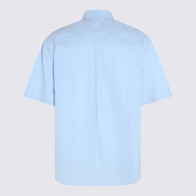 Shop Undercover Light Blue Cotton Shirt In <p>light Blue Cotton Shirt From  Featuring Short Sleeves, Button Closure, Chest Pocket, Cl