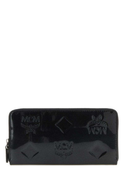 Shop Mcm Logo Debossed Zip In Black