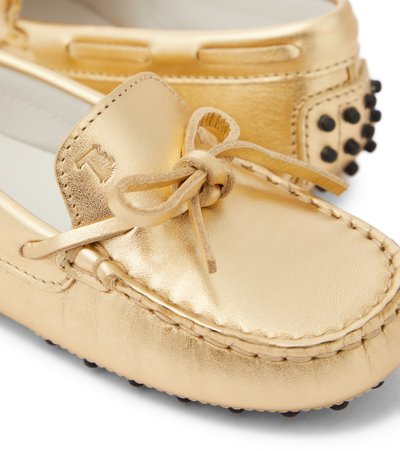 Shop Tod's Junior Gommino Metallic Leather Loafers In Gold