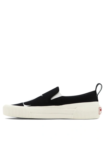 Shop Valentino Garavani "vltn" Slip-on In Black