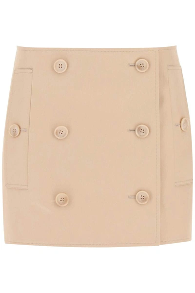 Shop Burberry Wrap Mini-skirt In Pink