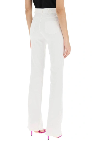 Shop Moschino Five Pocket Bootcut Jeans In White