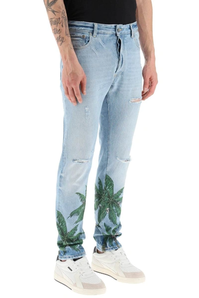 Shop Palm Angels Palm Tree Print Regular Fit Jeans In Distressed Denim In Blue