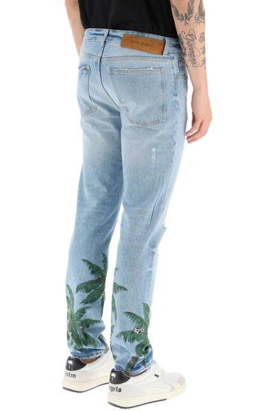 Shop Palm Angels Palm Tree Print Regular Fit Jeans In Distressed Denim In Blue