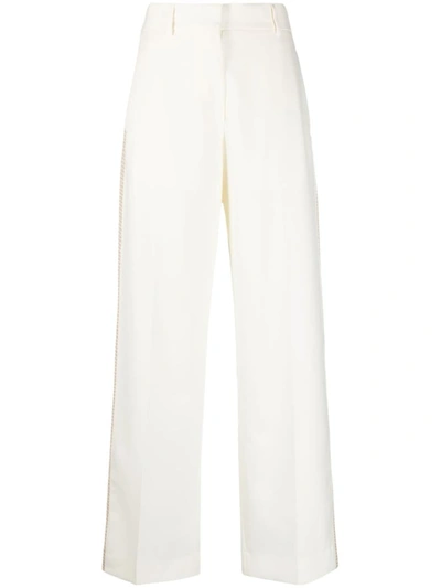 Shop Palm Angels Side-stripe Trousers In White