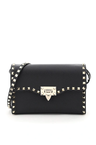 Shop Valentino Garavani Small Rockstud Crossbody Bag In Black