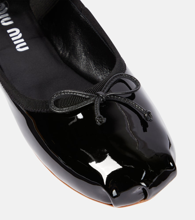 Miu Miu Logo-printed Bow Detailed Ballerina Shoes In Animal Print