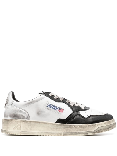 Shop Autry Super Vintage Leather Sneakers In White