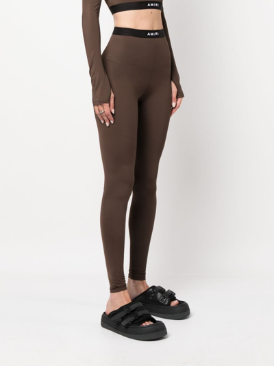 Shop Amiri Elasticated Logo-waistband Leggings In Brown