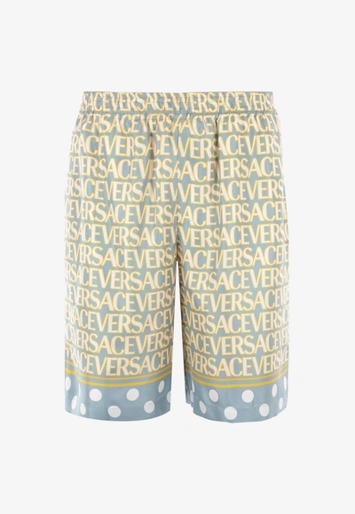 Versace Silk Bermuda Shorts With All-over Logo In Multicolor