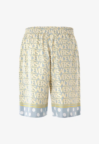 Versace Silk Bermuda Shorts With All-over Logo In Multicolor