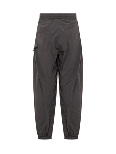 Shop Jw Anderson Twisted Joggers Pants In Black