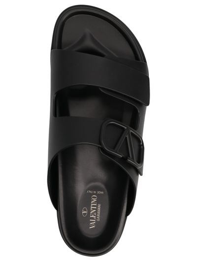 Shop Valentino Vlogo  Garavani Sandals In Black