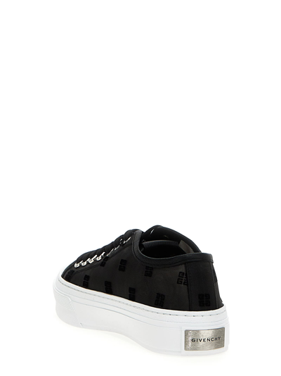 Shop Givenchy City Sneakers In White/black