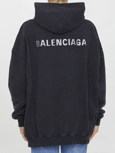 Shop Balenciaga Back Large Fit Hoodie In Black