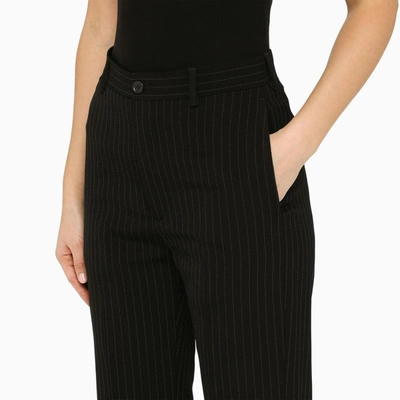 Shop Balenciaga Pinstripe Trousers In Black