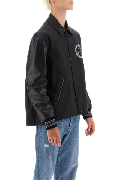 Shop Valentino Garavani Varsity Jacket With Leather Sleeves In Black