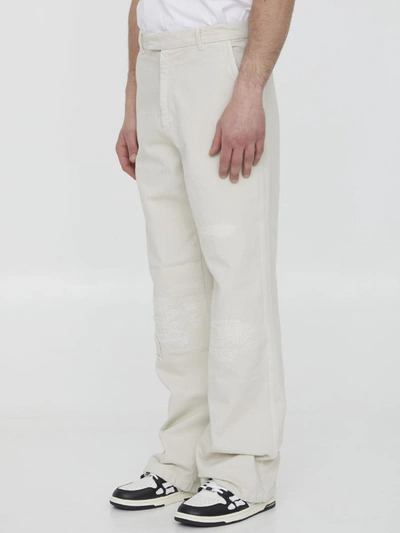 Shop Amiri Cream-colored Denim Jeans In White