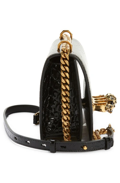 Shop Alexander Mcqueen Jewelled Knuckle Croc Embossed Leather Crossbody Bag In Black