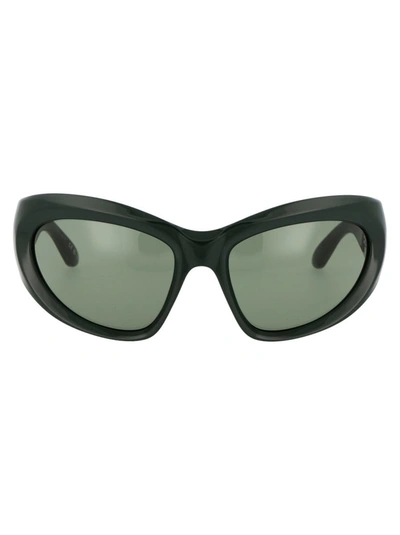 Shop Balenciaga Sunglasses In 002 Green Green Green