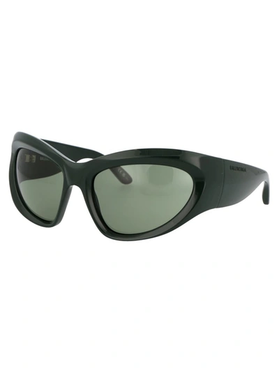 Shop Balenciaga Sunglasses In 002 Green Green Green