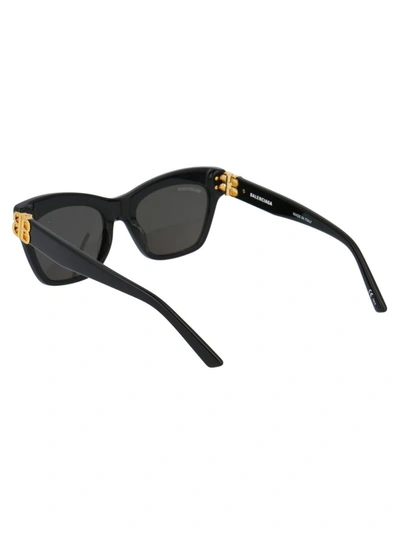 Shop Balenciaga Sunglasses In 001 Black Gold Grey