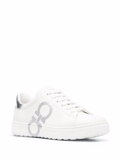Shop Ferragamo Sneakers In White