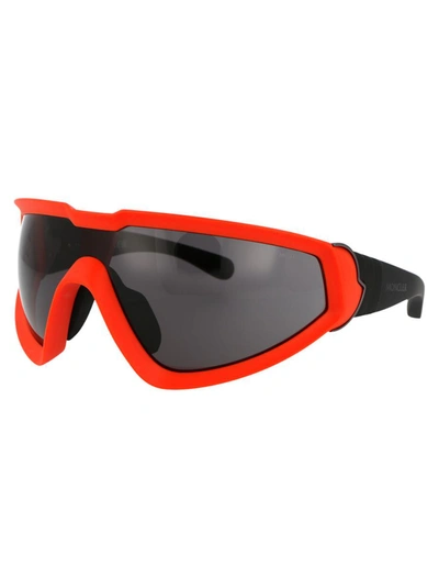 Moncler Eyewear Wraparound Frame Sunglasses In 43a Orange